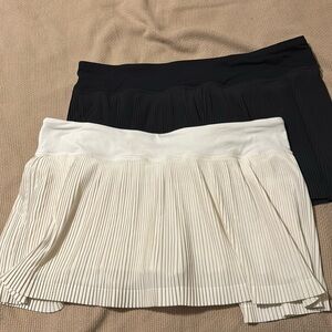 Two Pleat To Street Mid-Rise Skirts in Black and White